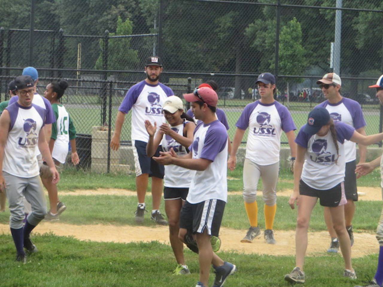 Group of athletes after softball game