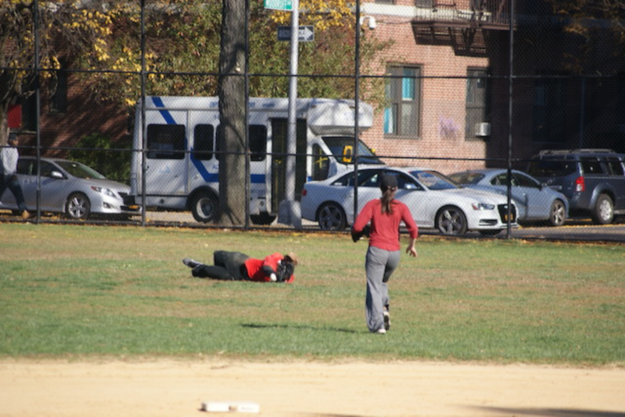 Lying player in red shirt