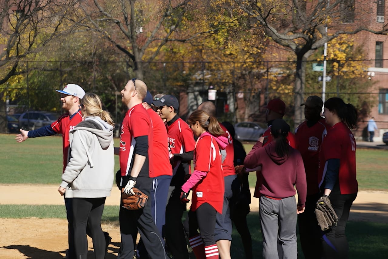 Team wearing red shirts outdoors