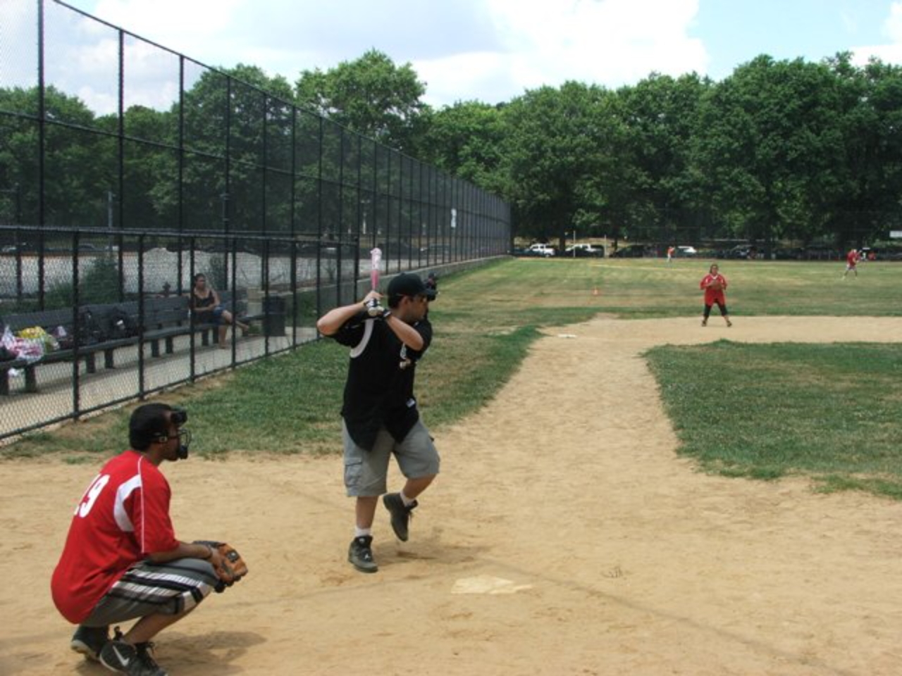 Baseball player preparing to swing bat
