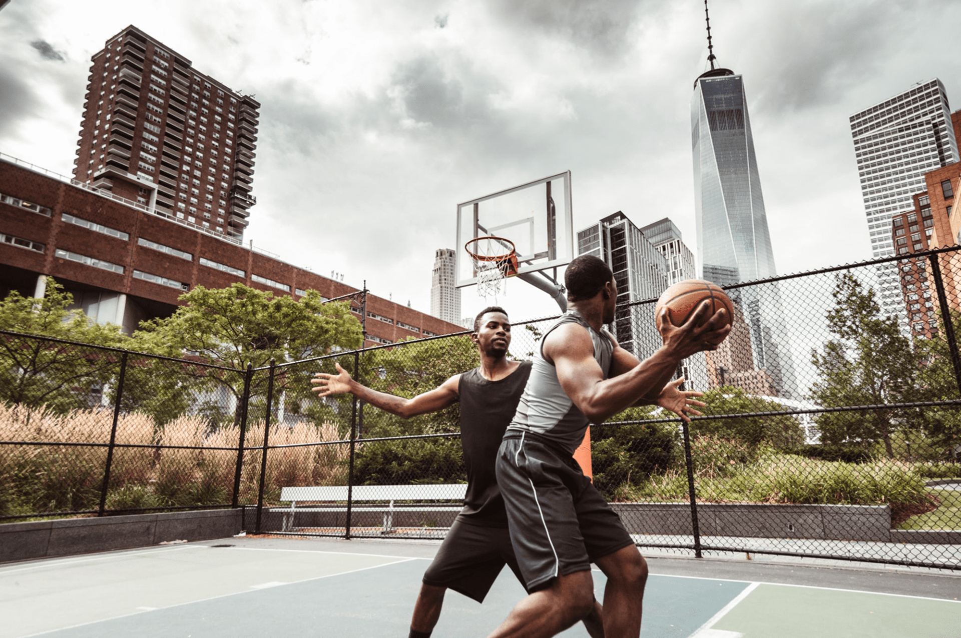 Intense basketball match in city setting