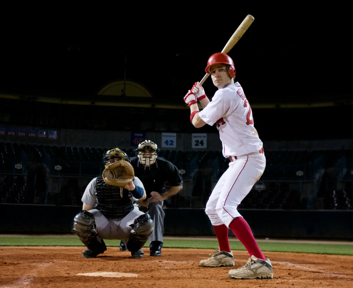 Baseball player ready to swing bat