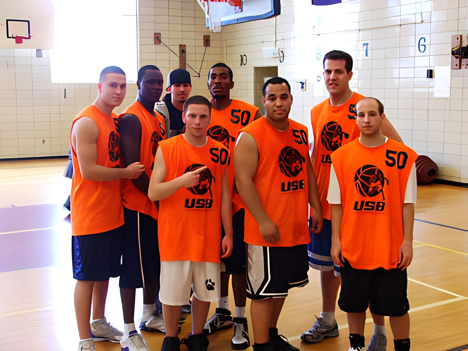 Basketball team in orange jerseys