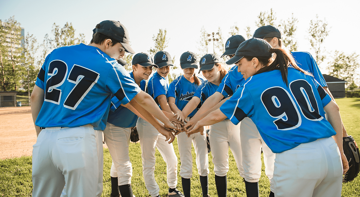 Baseball team huddle on field