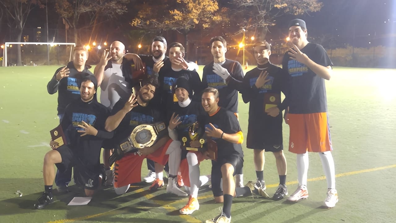 Team celebrating victory on sports field
