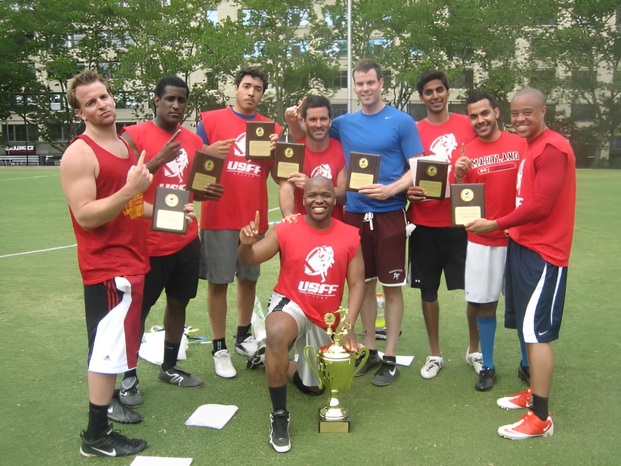 Group of athletes posing with awards.