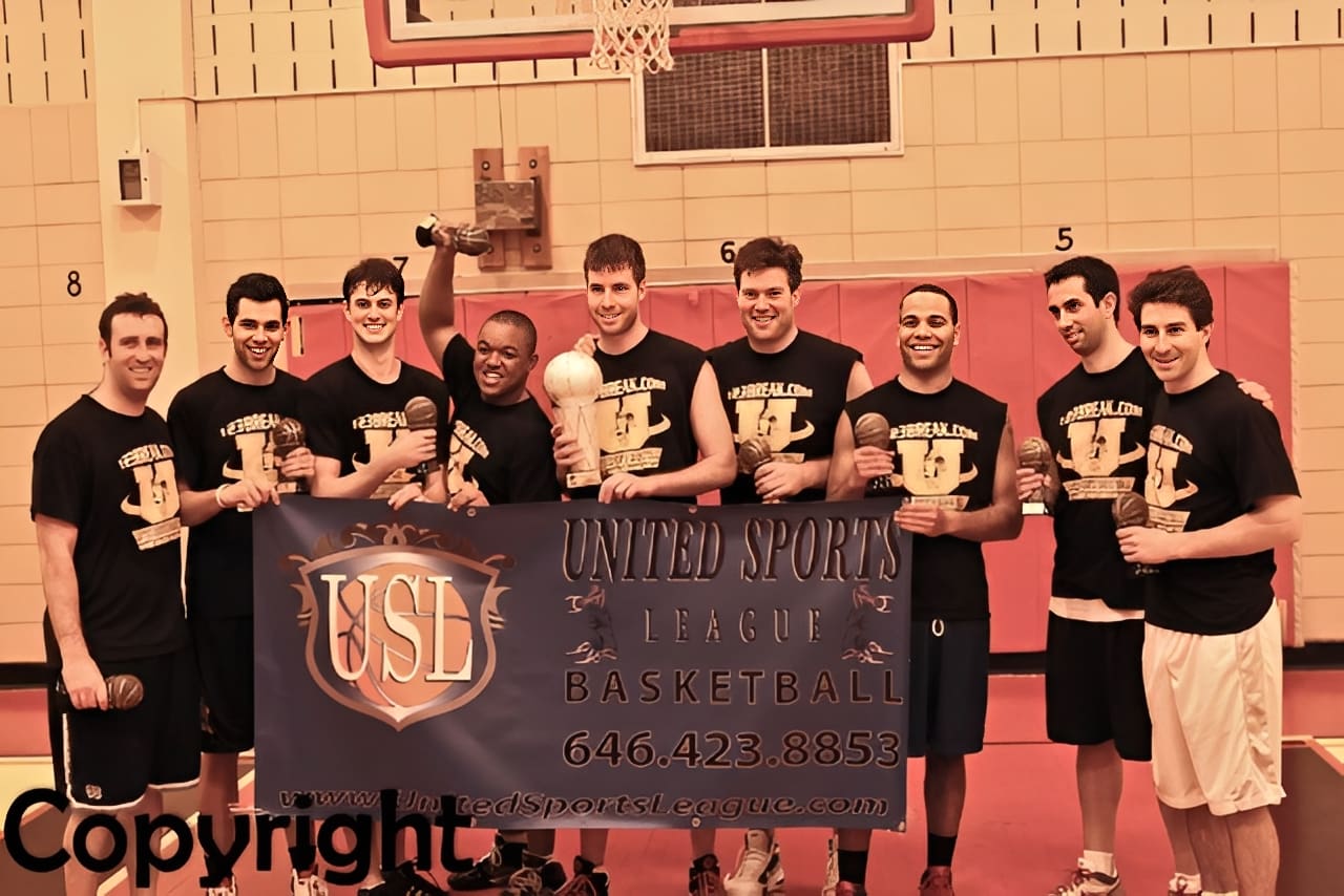 Winning team holding championship banner