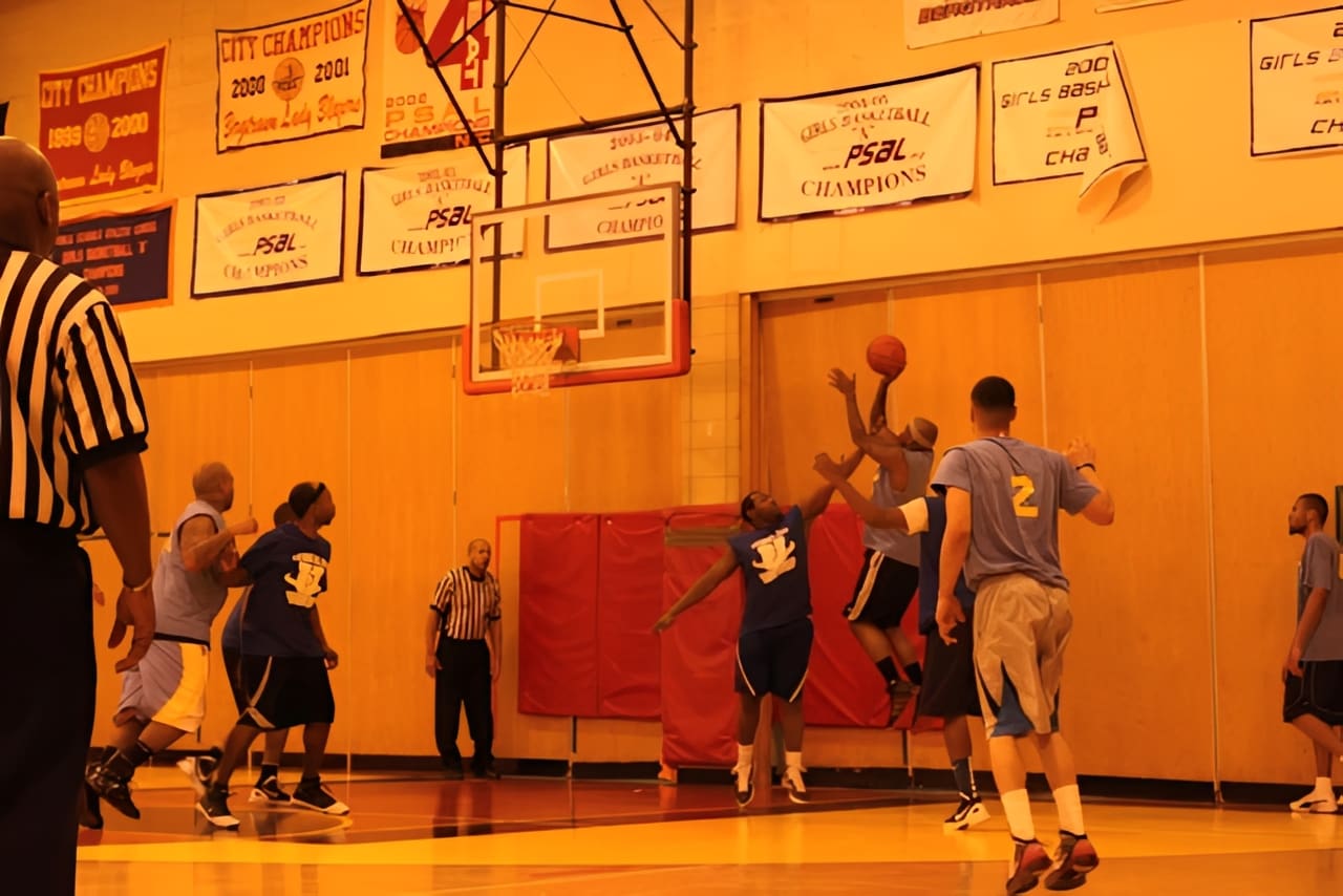 Basketball players near the hoop