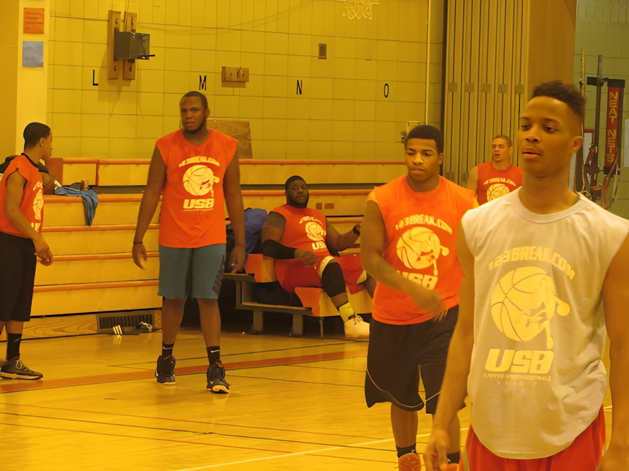 Group of athletes on basketball court