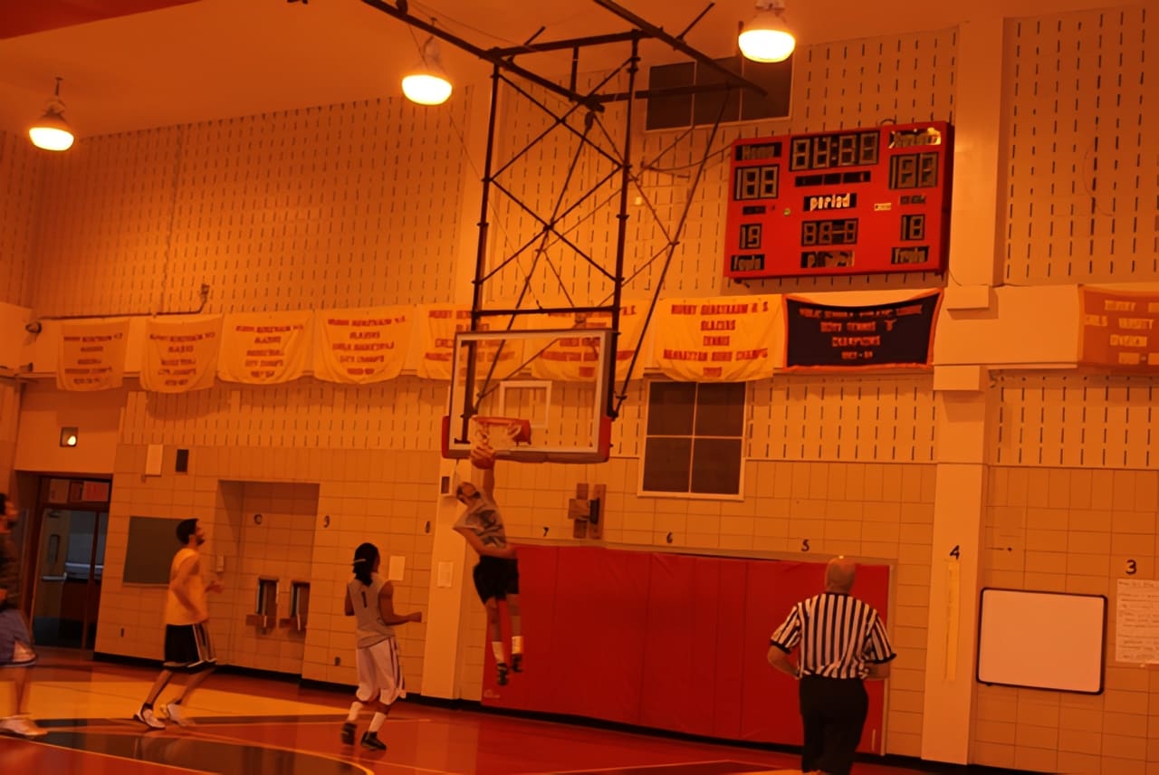 Indoor basketball game in action