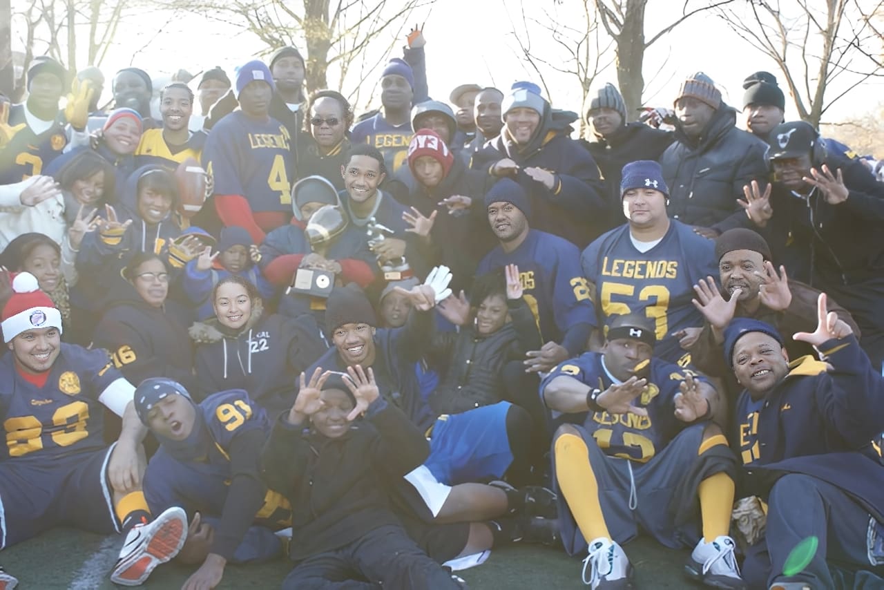 Group photo of football players outdoors